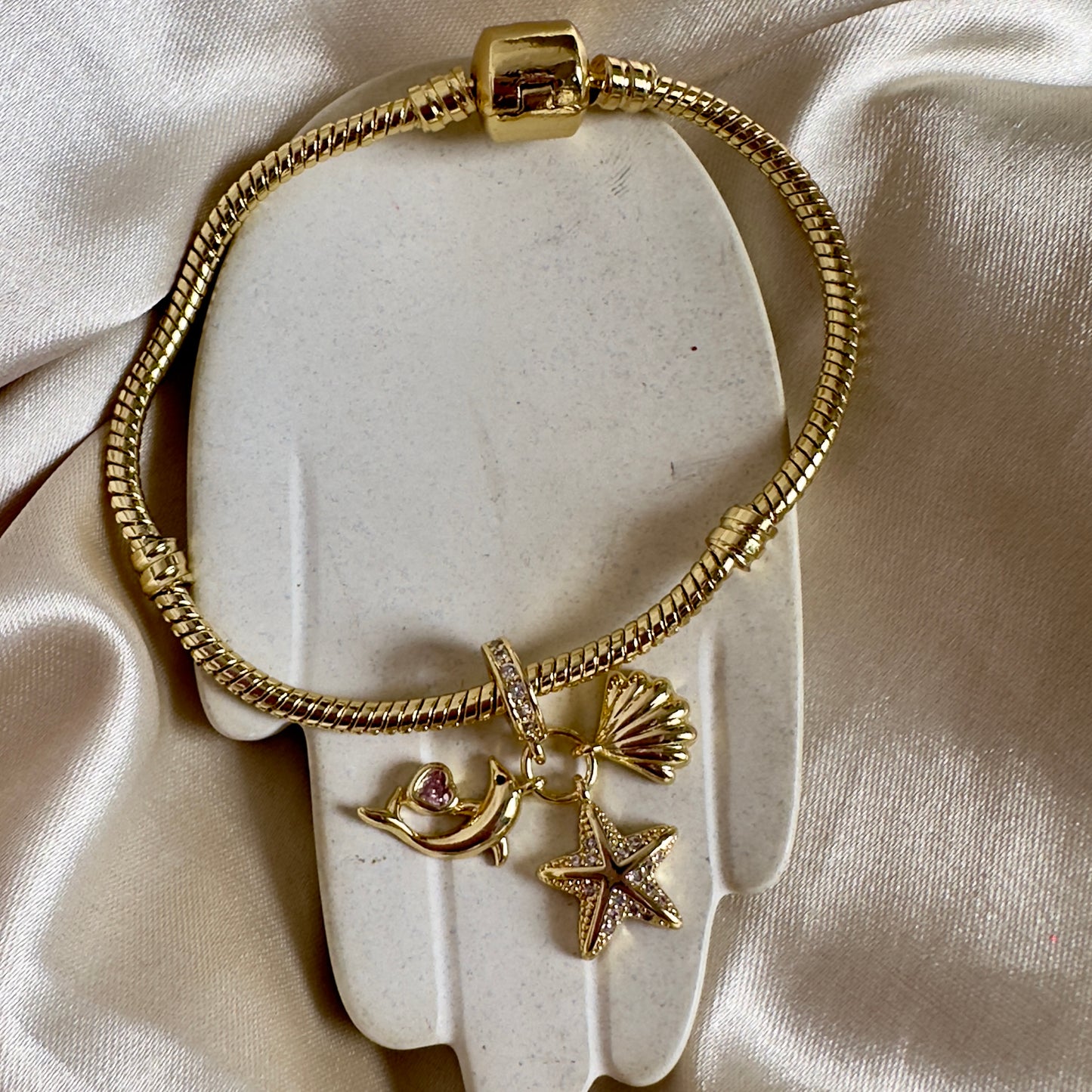Brazalete charm triple mar