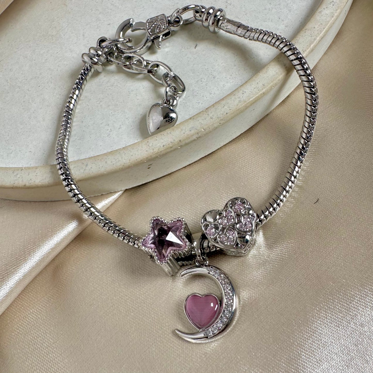 Pulsera plateada rosa