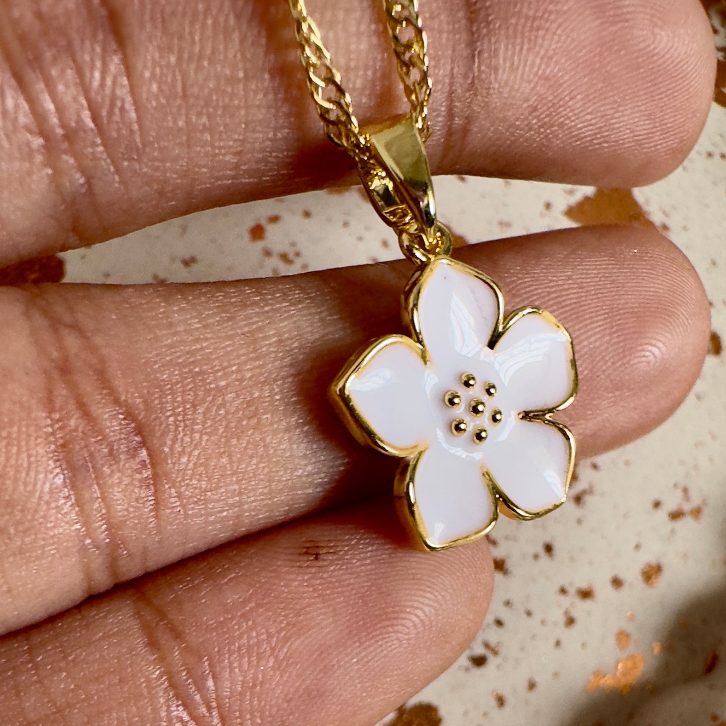 Cadena Singapur flor