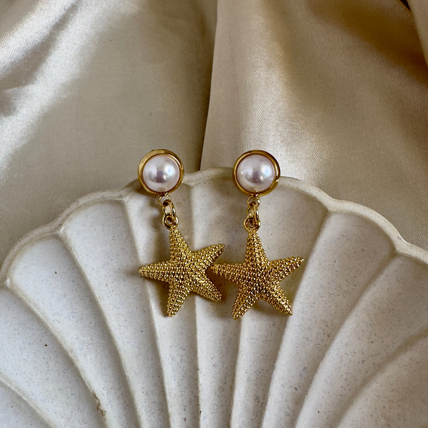 Aretes perla estrella