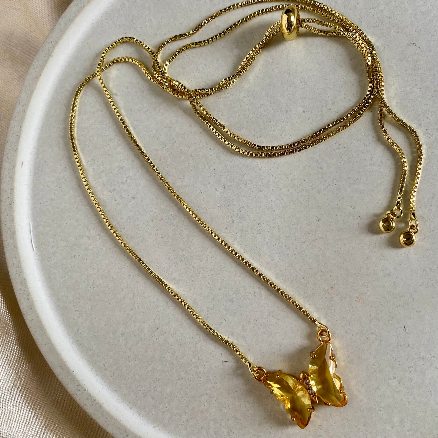 Cadena corbatín mariposa